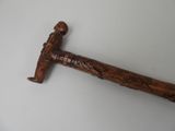 a wooden stick that has a handle on it