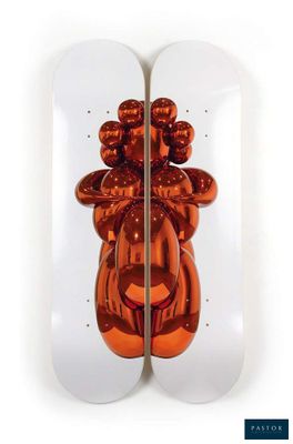a pair of skateboards that have a picture of a reindeer on them