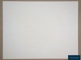 an empty piece of paper sitting on top of a cardboard box