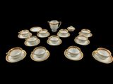 an image of a group of cups and saucers on a table