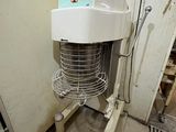 a machine that is sitting on a stand in a room