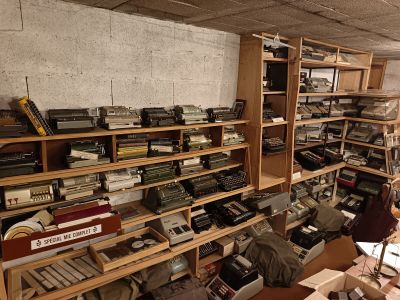a room full of old typewriters and other electronic equipment