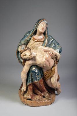 an image of a statue of a woman holding a baby