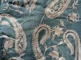 a close up of a piece of fabric with a paisley design on it