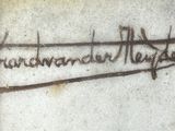 a close up of a writing on a wall