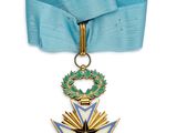 une image représentant un ruban bleu orné d'une croix dorée