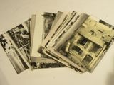 several old black and white photos of a building on a table