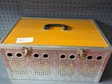 a metal box that is on a shelf in a store