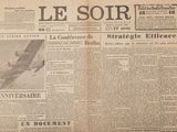 newspaper article with a picture of a plane flying in the sky