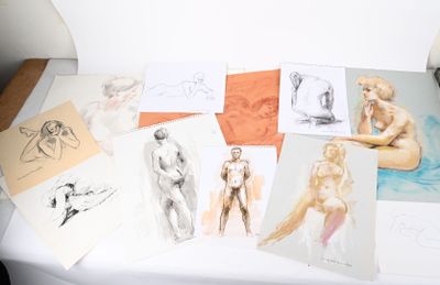 a lot of drawings that are on a table