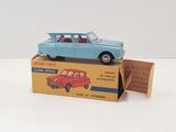 a blue toy car sitting on top of a box