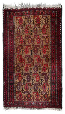 a rug with a red and brown design on it