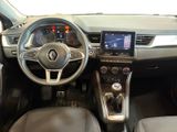 the interior of a car with a steering wheel and dashboard controls