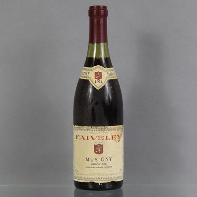 a bottle of wine that is sitting on a table