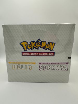 une boîte de cartes Pokémon sur fond blanc