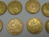 a group of six gold sovereigns