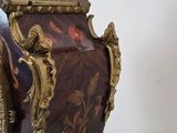 a clock that is sitting on top of a table