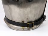 a metal bucket with a black belt around it