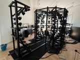 an image of a gym room with equipment on the floor