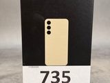 l'arrière d'une boîte noire sur laquelle figure un téléphone jaune