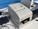 an image of a computer and printer sitting on a table