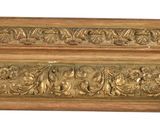 a gold frame with a decorative design on it