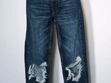 an image of a pair of jeans with holes on them