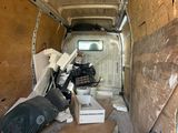a van that has a lot of stuff in it