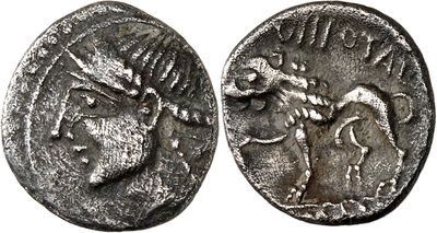a silver coin with an image of a woman on it