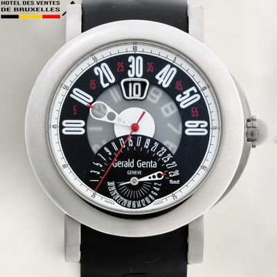 a black and white watch with a red second hand