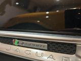 a close up of a car ' s emblem on the hood