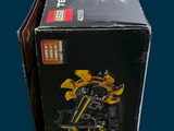 a box with a lego motorcycle inside of it