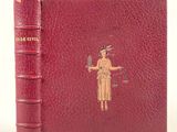 un vieux livre sur lequel figure l'image d'une dame tenant une épée