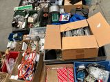 many boxes of assorted items sitting on the floor