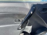 a close up of a door handle in a car