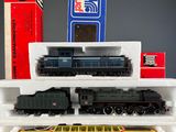 a toy train that is sitting on top of a shelf