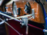 a close up view of the steering wheel of a vintage car