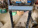 a machine that is sitting on a table in a garage