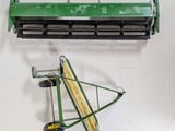 a green and yellow toy airplane next to a green and yellow toy plane