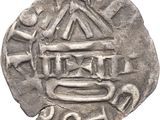 a close up of a coin on a white background