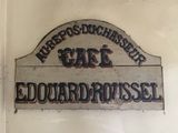 a sign on the wall of a cafe that says cafe edward russell