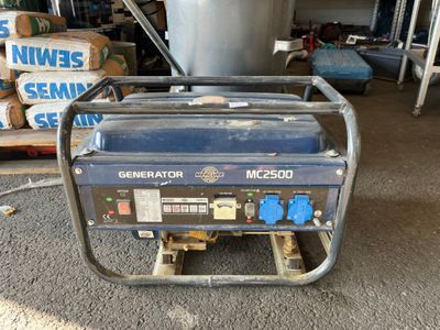 a generator that is sitting on a cart in the garage