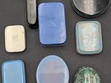 many different types of soaps and soap bars on the table