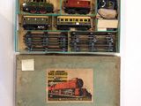 a box with a train set inside of it