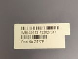 a close up of the back of a laptop with a barcode on it