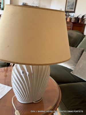 a lamp that is sitting on a table in a living room