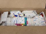 a cardboard box filled with lots of business cards
