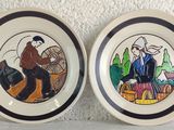 two plates with a picture of a man and a woman on them