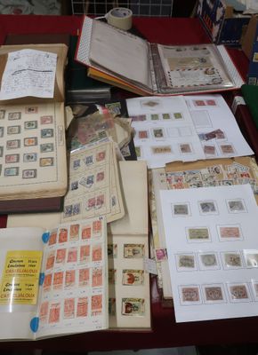 a table with many different types of stamps on it