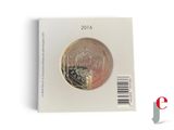 an image of a silver coin on a white card with a barcode